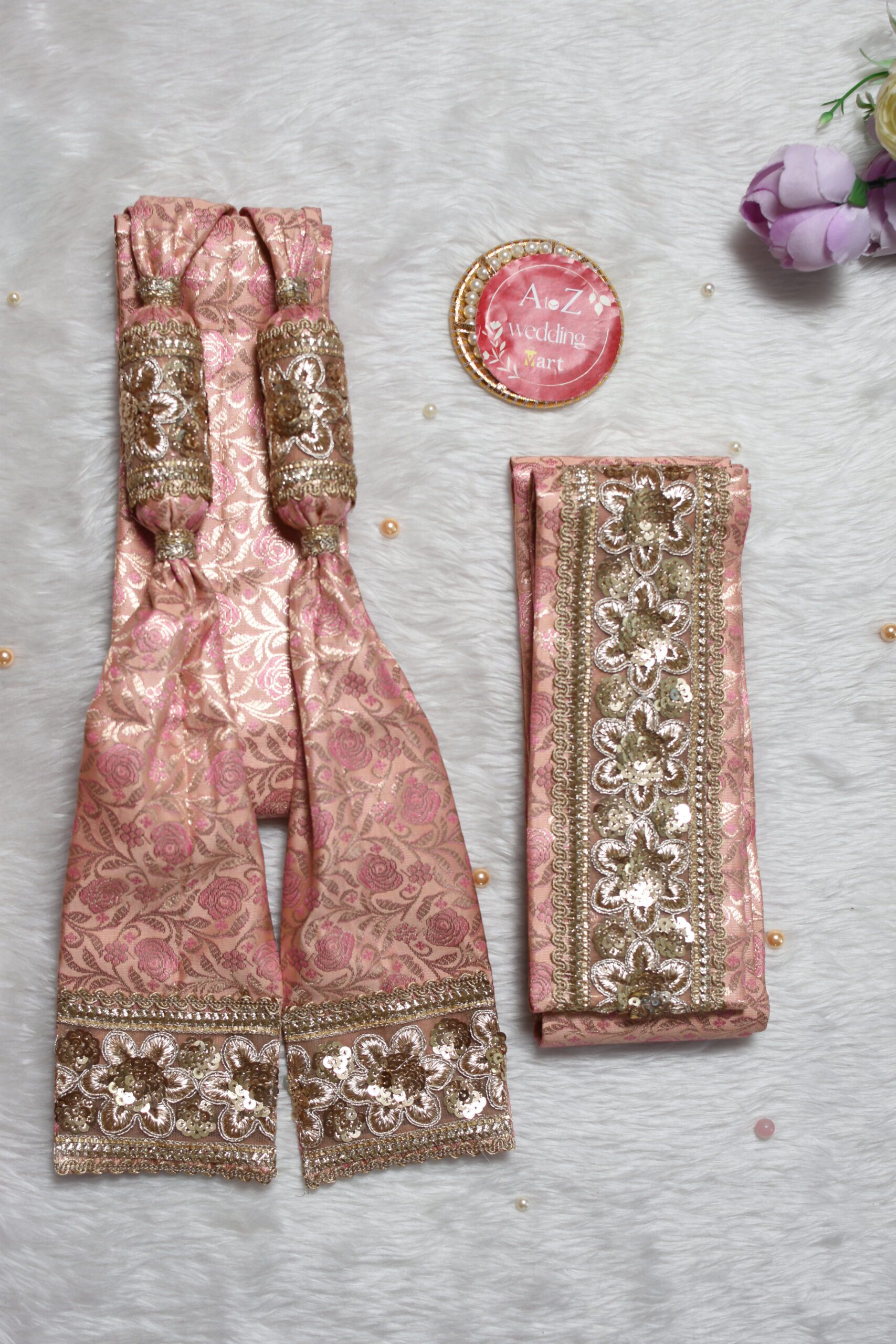 Designer Peach Gathjoda and matching Kamarbandh for modern groom wedding rituals.