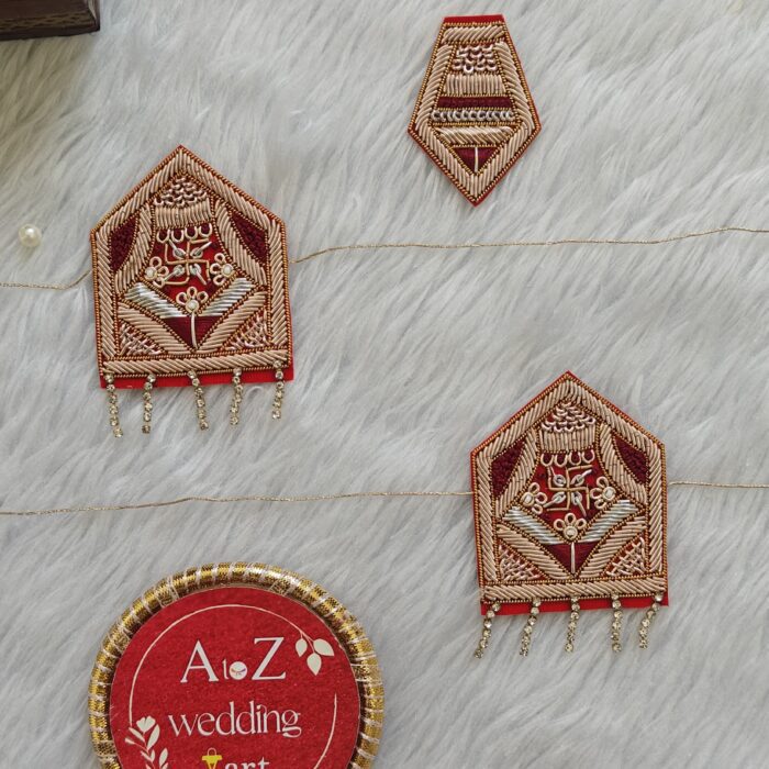 Designer Marwadi wedding Sevra for bride and groom with red and gold detailing