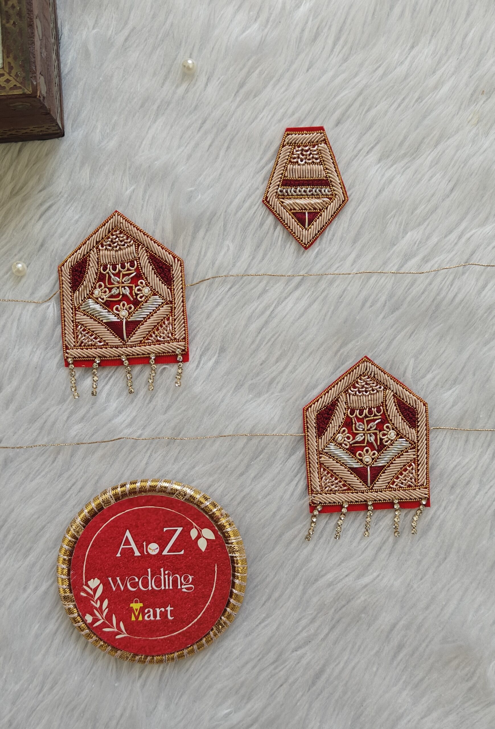 Designer Marwadi wedding Sevra for bride and groom with red and gold detailing